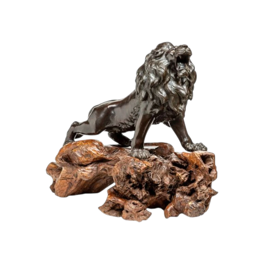 Japanese bronze figure of a prancing lion