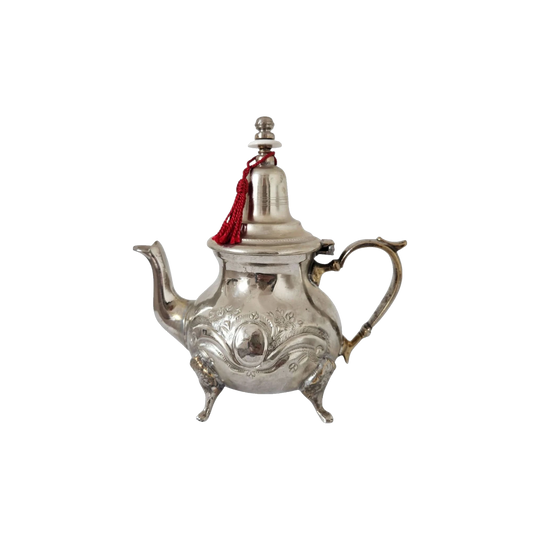 Vintage Moroccan Silver-Plated Teapot with Red Tassel and Ornate Scrollwork