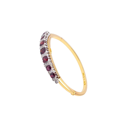 CG Hallberg Swedish 18 Karat Gold & Platinum Garnet and Diamond Convertible Bangle, c.1911