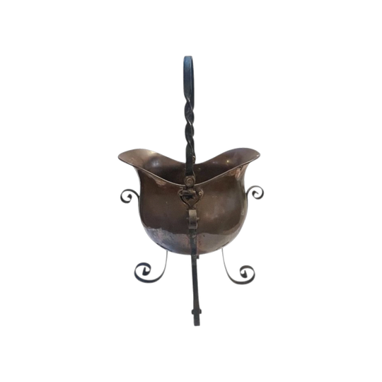 French helmet shaped copper jardiniere mounted in the original wrought iron stand