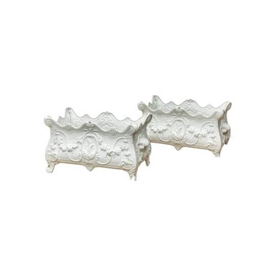 Pair of matt white painted cast iron jardinières, French, 19th century