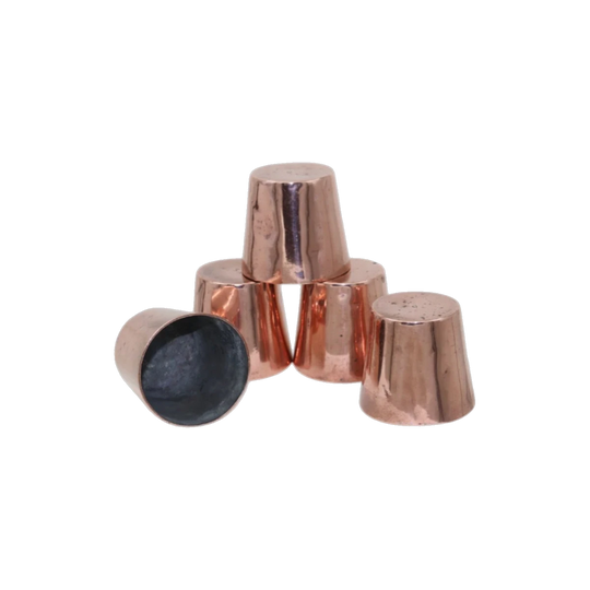 Set of five copper dariole moulds