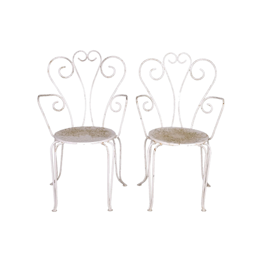 Pair of Vintage French outdoor wrought iron armchairs with a white patina