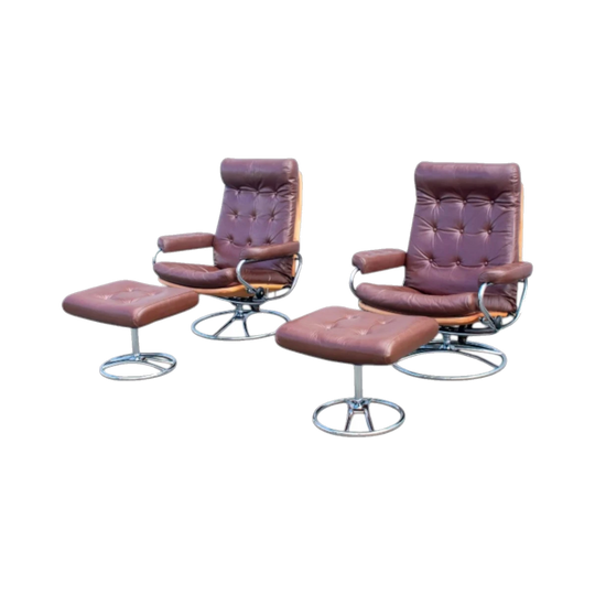Pair of Coffee‑Bean Leather Recliners with Footstools – Attributed to Stressless, Vintage/Mid‑Century Inspired, Chrome Bases, Patented Glide System
