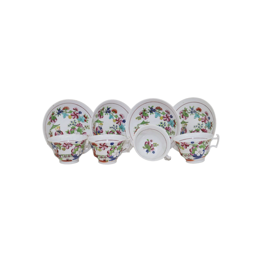Set of four hand coloured cups and saucers by Hilditch