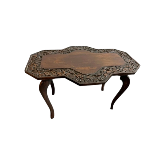 Carved wood side table