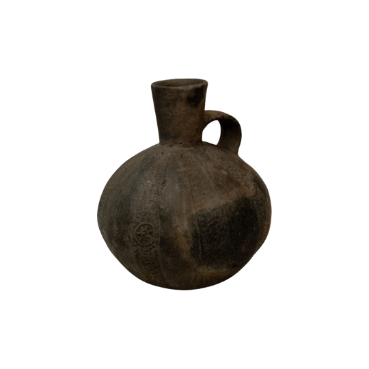 A Pre-Columbian Chimu blackware gourd shaped vessel with handle at the neck
