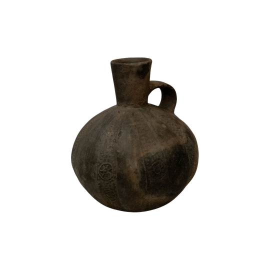 A Pre-Columbian Chimu blackware gourd shaped vessel with handle at the neck