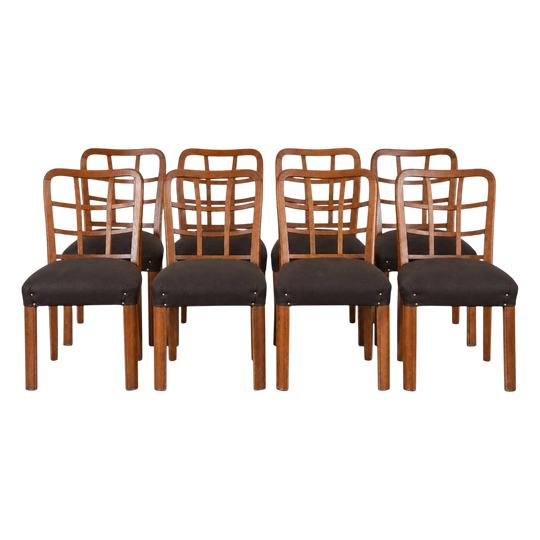 A Set of Eight Italian Art Deco Oak Dining Chairs, by Vittorio Valabrega