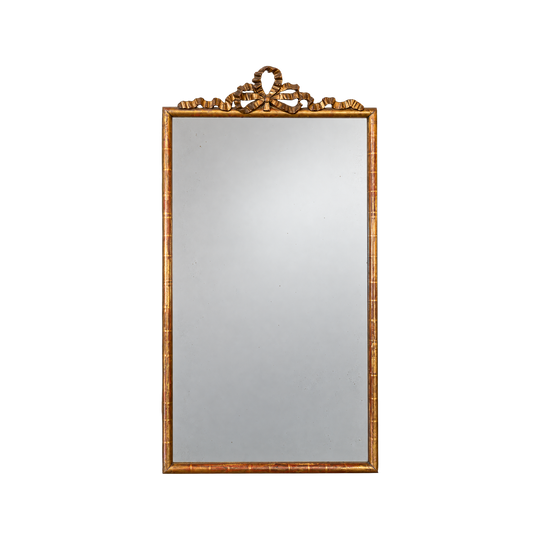 A GILTWOOD MIRROR WITH RIBBON CREST