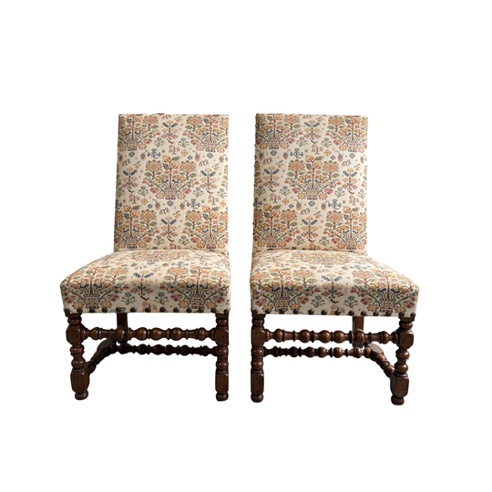 A Pair of Louis XIII Walnut and Upholstered Chairs