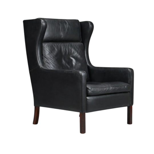 Stouby Furniture. Wing chair, black leather