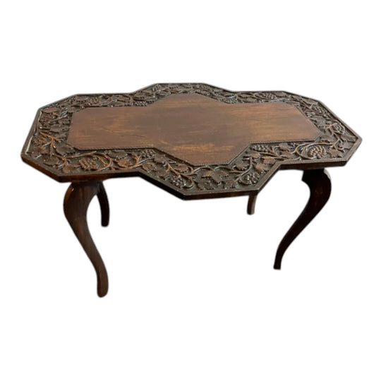 Carved wood side table