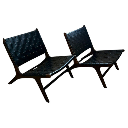 A pair of woven  genuine leather armchairs