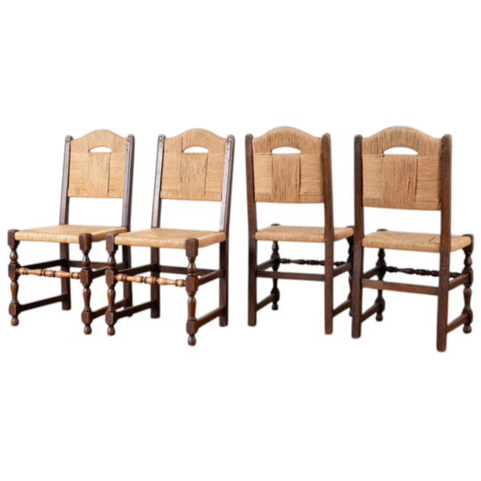 A Set of Eight French Oak and Rush Dining Chairs