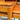 Close-up of the corner and leg of a Rare set of Alpa Teak Nesting Tables – Set of 3, showcasing smooth, polished surfaces and rich wood grain in a warm finish—a true Australian Mid-Century Modern classic.