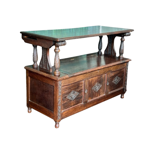 Arts & Crafts Oak  'Monks Table', profusely carved dated 1926