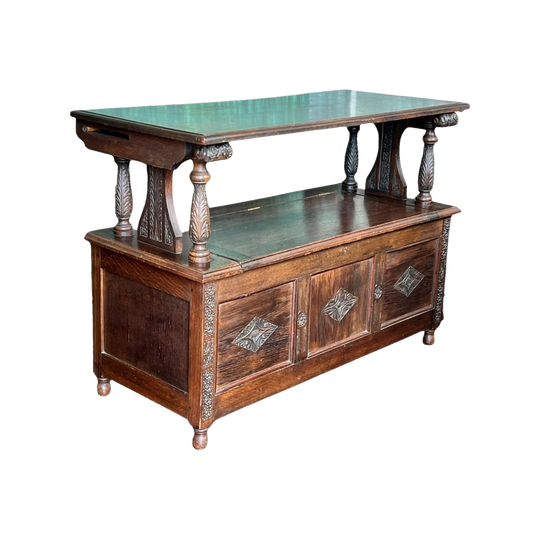 Arts & Crafts Oak  'Monks Table', profusely carved dated 1926