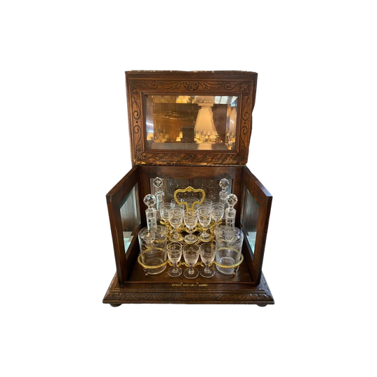 Napoleon III Period Tantalus Liquor Cave in Carved Oak with Bevelled Glass, 4 Crystal Decanters and 16 Glasses, France c.1860