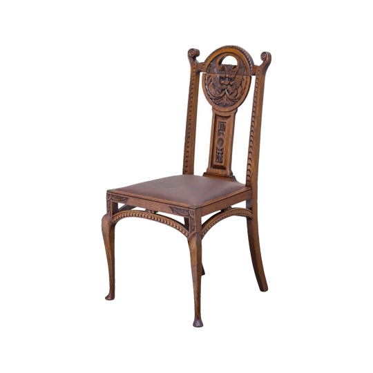 Set of Four Hand-Carved Chestnut 'Man of the Northwind' Dining Chairs, c. 1900