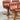 A rare set of 4 vintage Joe Rufenacht lounge chairs in Howe leather with curved wooden frames are arranged on a polished concrete floor against a plain white background.