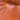 Close-up of a brown Howe leather surface with center button tuft and minor scratches—authentic details found on the Rare Set of 4 Vintage Joe Rufenacht Lounge Chairs.
