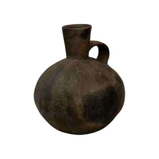 A Pre-Columbian Chimu blackware gourd shaped vessel with handle at the neck