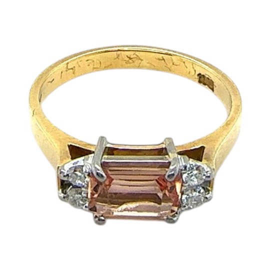 18ct yellow gold and topaz ring with 4 diamonds