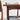 Close-up of the fully restored Parker 140 Square Extension Table (Rediscover) with two chairs featuring black seats and backrests, set against a light-colored wall for a timeless look.