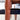 Close-up of a scratched chair leg among other Vintage Parker Dining Suite 5 Piece Square - Number 140 chairs, all with black seats and wooden legs, highlighting Scandinavian-inspired Australian design on a light floor.