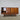 1960s Danish modern sideboard with sliding doors and drawers, showing internal mirror
