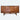 Authentic mid‑century Danish teak sideboard with four sliding doors, carved recessed handles, four lower drawers, and a sculptural tapered‑leg stretcher base