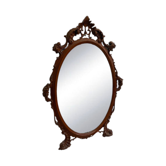 Ornately Carved 20th Century Oval Bevel Edge Mirror