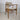 Front/side profile of Sven Åge Eriksen GM11 chair with curved teak armrest and upholstered cushions.