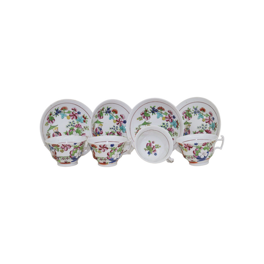 Set of four hand coloured cups and saucers by Hilditch