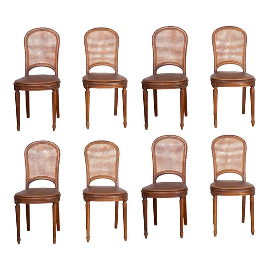Set of 8 Antique French cane bistro dining chairs with removable leather seat pads