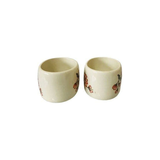 A boxed Pair of Royal Worcrester Spode Porcelain Napkin Rings By Palissy Pottery