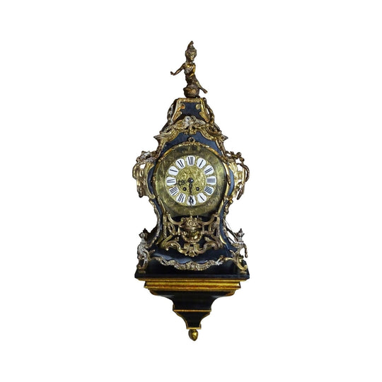 A large antique French black lacquer with bronze mounts mantle clock