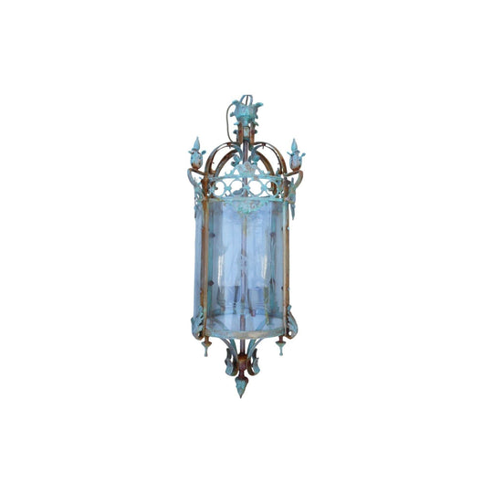 A large French Louis XV style cast brass cylinder shaped lantern