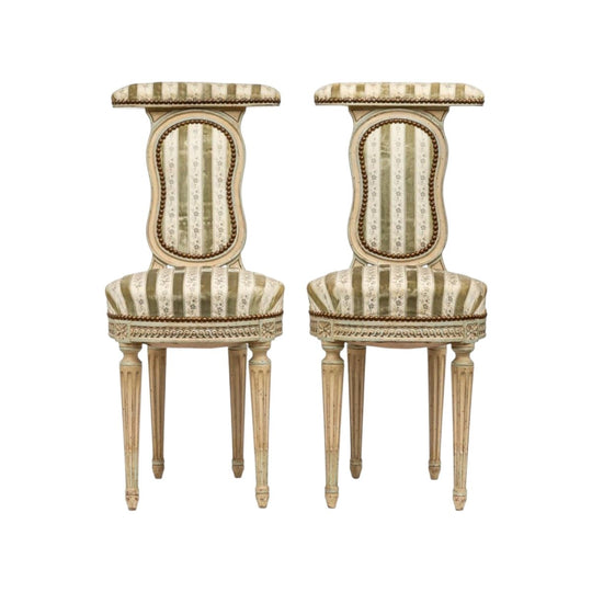 A pair of cream-painted and floral striped velvet upholstered boudoir chairs French 19th Century