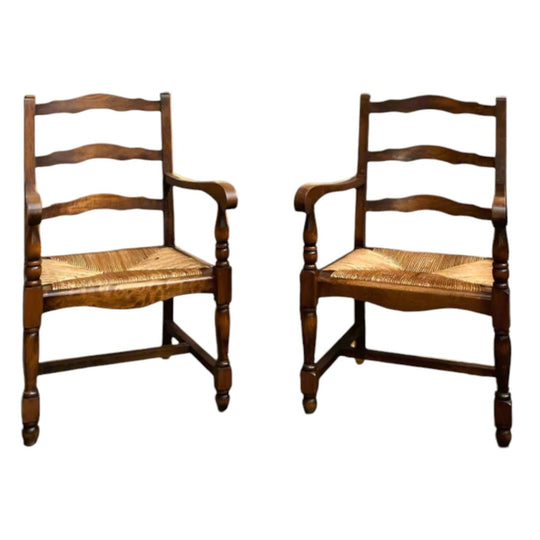 A pair of French Art Deco period, Louis XV style, solid cherrywood 'Fauteuil' armchairs