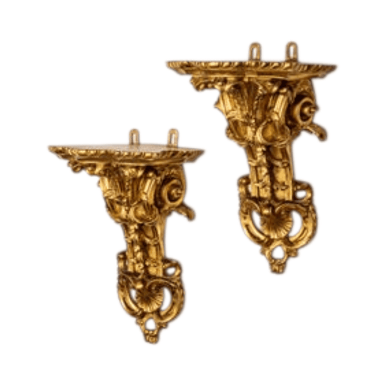 A pair of French Louis  XVI style,  19th century carved and gilded wood  Rococo wall brackets