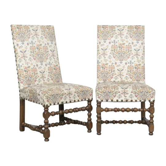 A Pair of Louis XIII Walnut and Upholstered Chairs