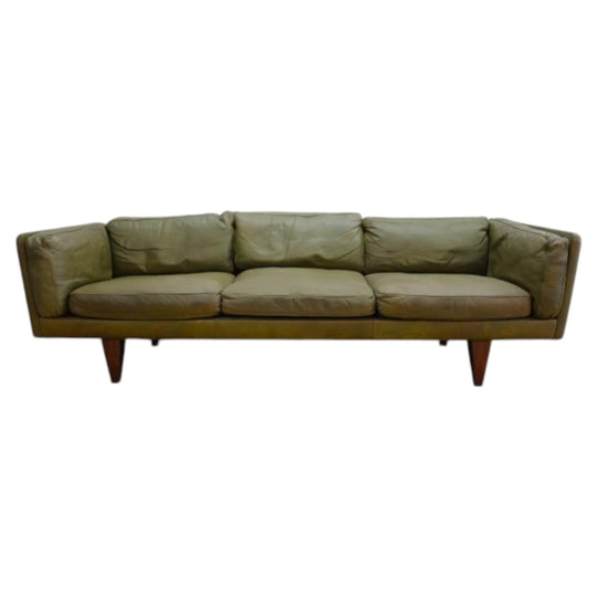 A sofa designed by Illum Wikkelsø for Holger Christiansen