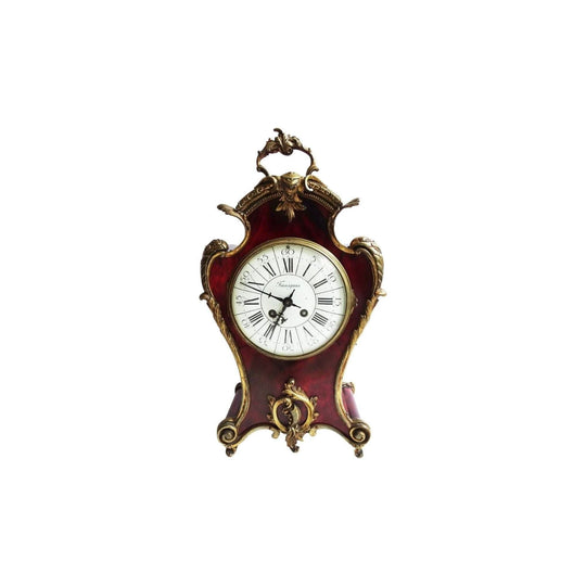 A tall antique French ormolu mounted red faux shell Mantel clock