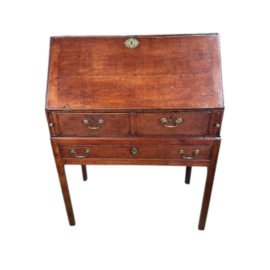 An 18th Century Oak Bureau on Stand.