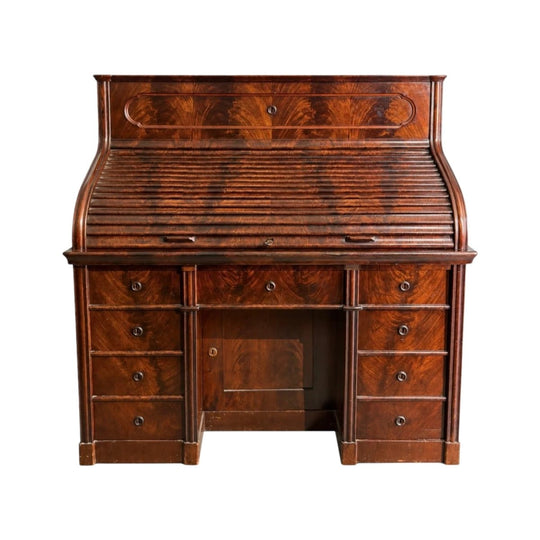 An Exceptional Biedermeier Flame Mahogany Roll-Top Desk