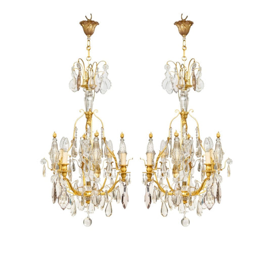 An exquisite pair of gilt bronze and crystal four-light obelisk chandeliers, French Circa 1930