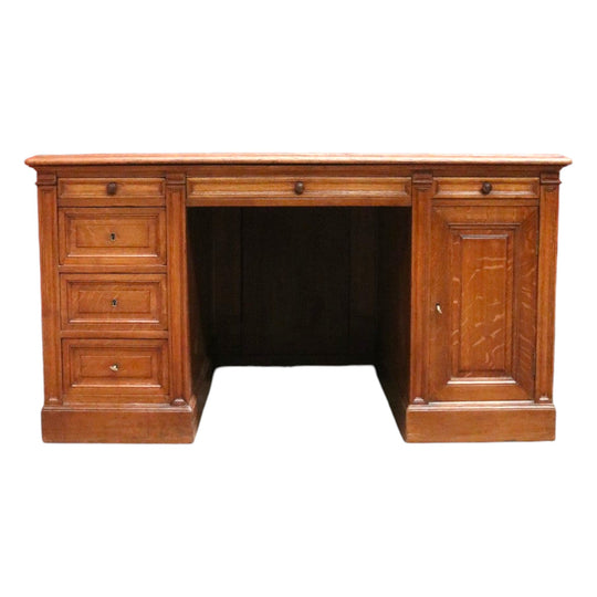 Antique English oak and tan leather office desk with drawers and cupboard. B12635