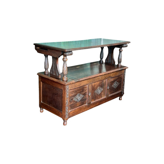 Arts & Crafts Oak  'Monks Table', profusely carved dated 1926